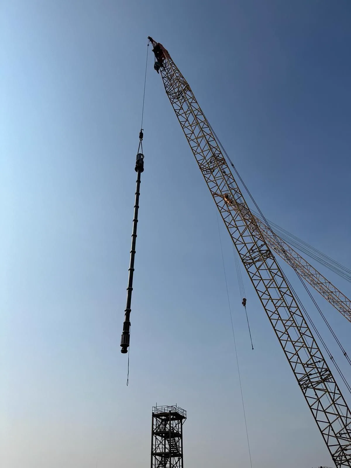 Cargo pump lifted by crane for overhaul handling